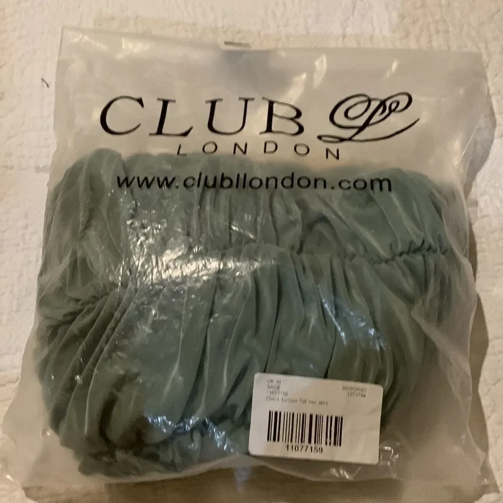 Club London Mini skirt sage. NWT. Size 6